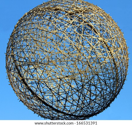 giant Christmas decorative ball as a huge ball on blue sky background