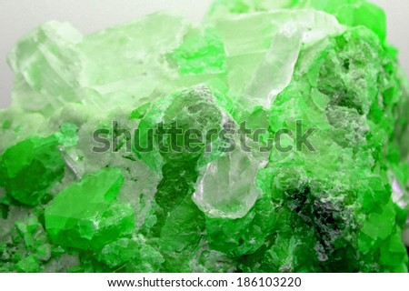 Rock with valuable green mineral just found by geologist during an excavation