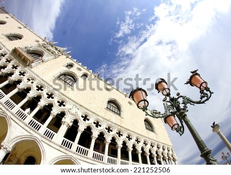 splendid Ducal Palace in Venetian-style architecture in Venice with street lights