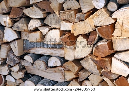 detail of Woodshed with pieces of wood cut for the stove a