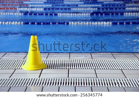 wet floor cone signal in the big Olympic pool
