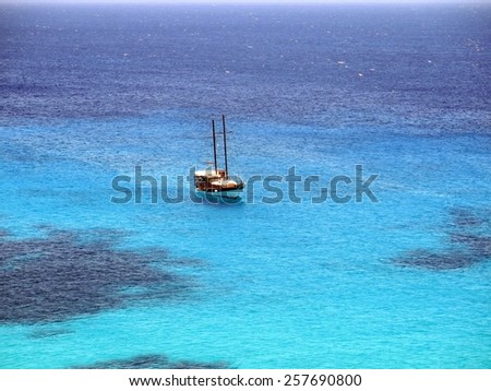 fantastic luxury boat in the middle of the blue sea in summer