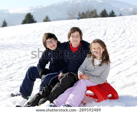 European family portrait with three brothers two males and one female in mountain