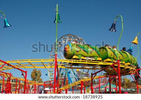 Brightly Colored Kiddie Rides At A County Fair Stock Photo 18738925 ...