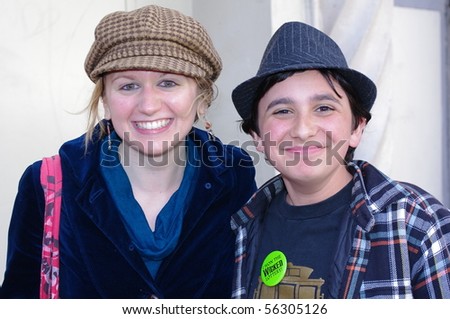 SAN FRANCISCO- MARCH 23: Broadway theater actress Felicia Ricci (left) greets theater fan Joseph Weinberg at the stage door of Wicked in San Francisco, California on March 23, 2010.