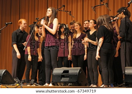 EVANSTON, ILLINOIS- NOVEMBER 13: A cappella singing group Purple Haze of Northwestern University performs in The Best of the Midwest Concert on November 13, 2010 in Evanston, Illinois.