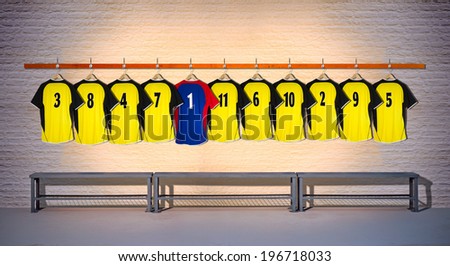 Row of Yellow Football Shirts with Blue Shirt 3-5