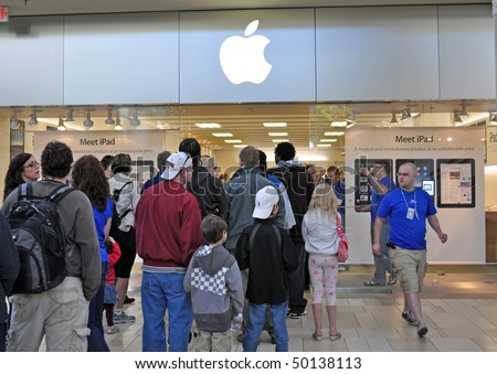 MINNETONKA MN. - APRIL 3:  Customers waiting in line to purchase Apple Ipads on launch day, April 3, 2010, at the Apple Store in Minnetonka, MN.