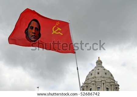 ST. PAUL - MAY 7: A political sign is waved  at the Tax Cut Rally at the state capital on May 7,2010 in St. Paul, Minnesota.
