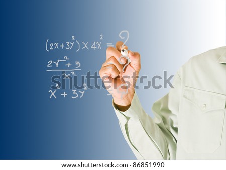 Teacher pointing at board