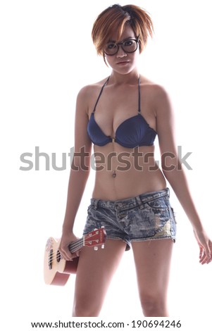 Glasses model in bikini with small guitar