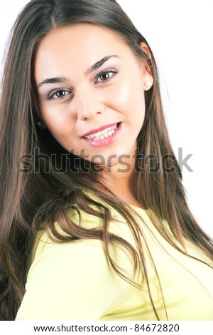 Closeup portrait of young woman casual portrait in positive view, big smile, beautiful model posing in studio over white background . Isolated on white.