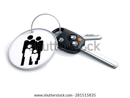 Set of car keys with keyring with family icon. Concept for owning a family or passenger sedan or car.