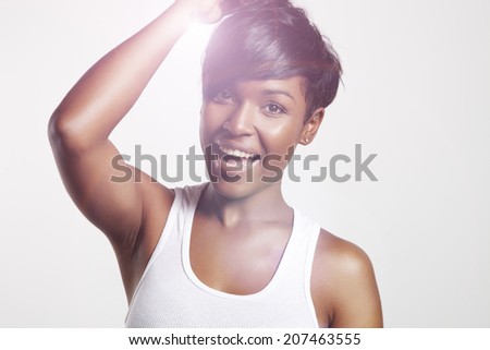 happy black woman looking at camera