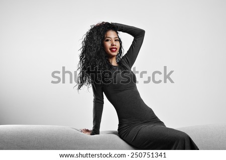 perfect fit black woman with a curly hair and red lips