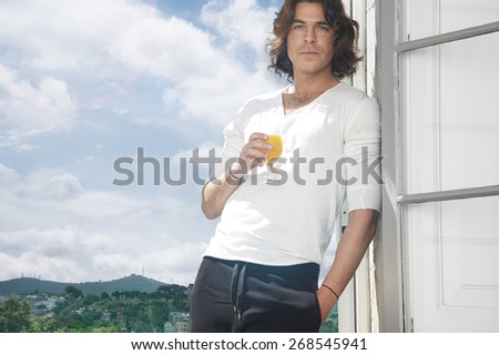 man drinking juice. Mountain view