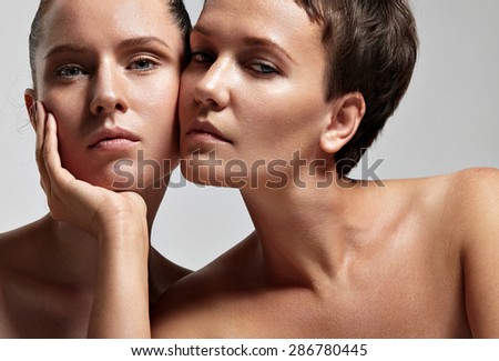 portrait of two young woman with a different skin type