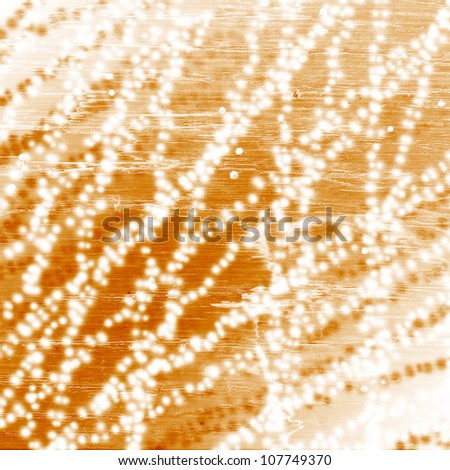 brightness of the particles on an orange background