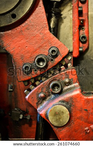 red gears, detail of a vintage print press