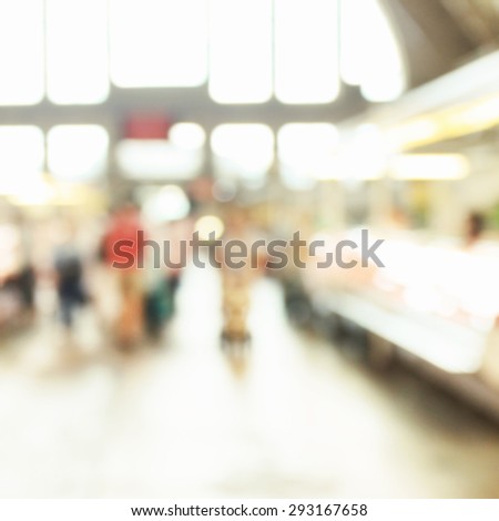 People at crowded place at market, unfocused effect