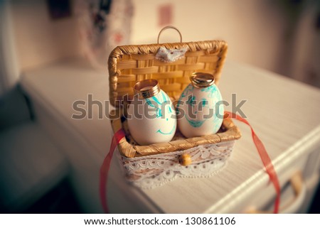 Wedding rings on the eggs in a straw box handmade. wedding theme
