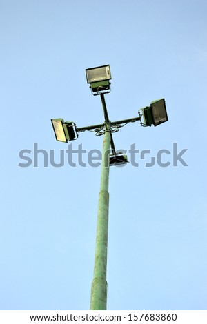 four park light poles with sky backgrounds