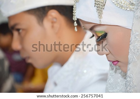 Indonesian bridal couples were undergoing the marriage ceremony event