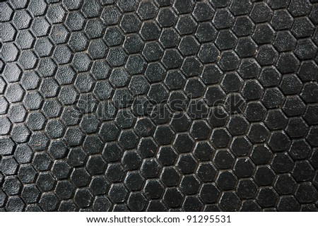 honeycomb pattern on the black rubber mats