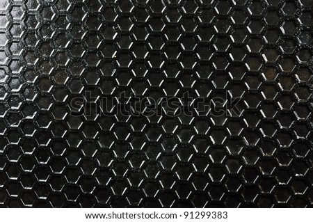 honeycomb pattern on the black rubber mats