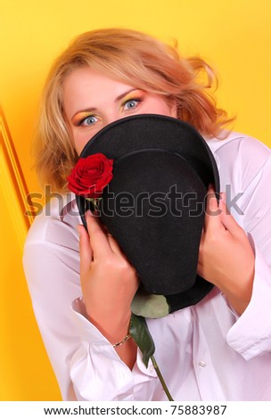 Woman and hat and rose