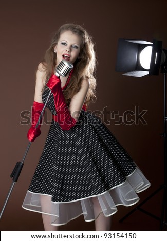 Pin-up girl and vintage microphone