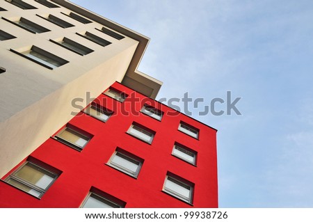 Apartment house, town building on blue sky