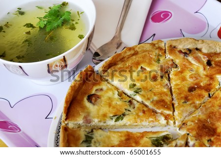 French cuisine.Chicken broth.Quiche- oven-baked dish that is based on a custard made from eggs and milk