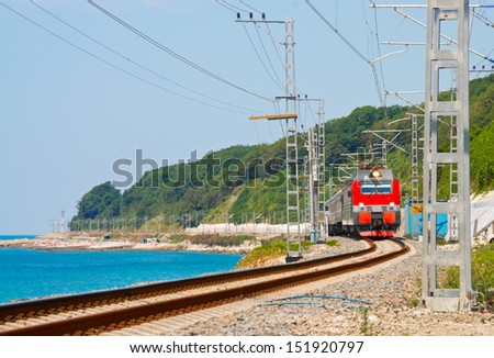 Train travels along the coast of the Black Sea. Krasnodar region. Russia.