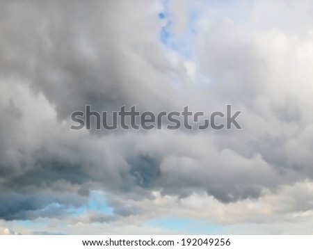 Editable vector illustration of a cloudy sky made using a gradient mesh