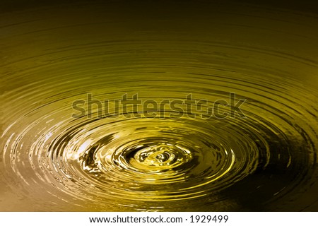 Background abstract of ripples on a golden pond