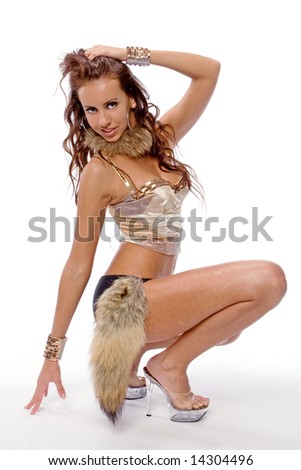 The beautiful girl in a dancing suit with the fox tail