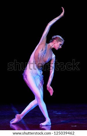 MOSCOW, RUSSIA - DECEMBER 08: Dancer on Charity concert in Nations Theater in Moscow, Russia, December 08, 2012