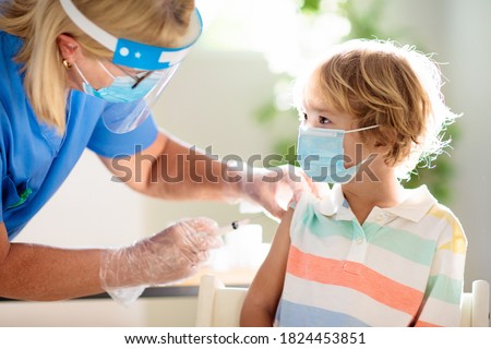 Similar – Image, Stock Photo Nurse examining little boy in clinic