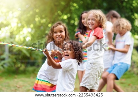 Similar – Foto Bild fröhlicher Junge, der draußen im Park spielt