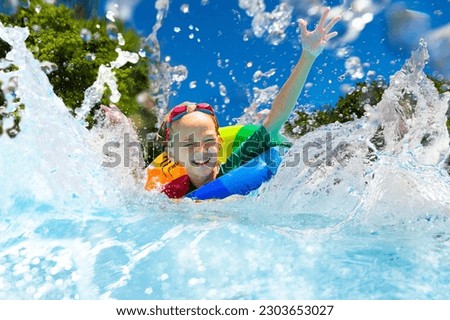 Similar – Image, Stock Photo Funny boy diving on a swimming pool