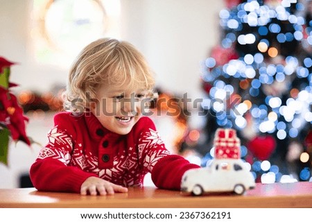 Similar – Image, Stock Photo Child playing with tree