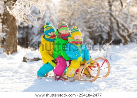 Similar – Image, Stock Photo People with sledges in the Harz Mountains against the light