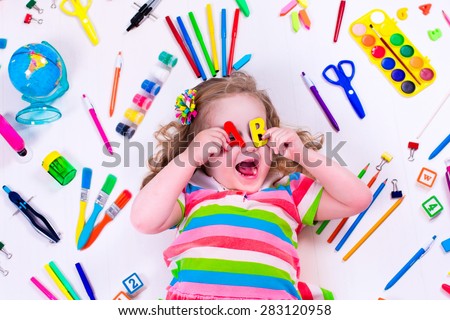 Child with draw and paint supplies. Kids happy to go back to school. Preschool kid learning and studying. Creative children at kindergarten. Office supply objects collection.