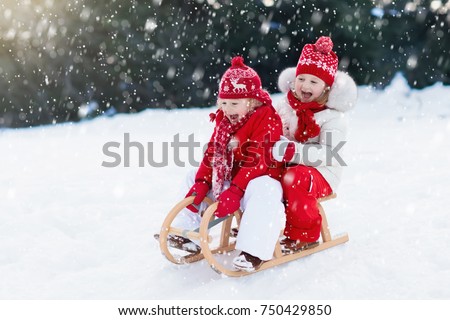 Similar – Image, Stock Photo Little girl sledding at Sierra Nevada ski resort.