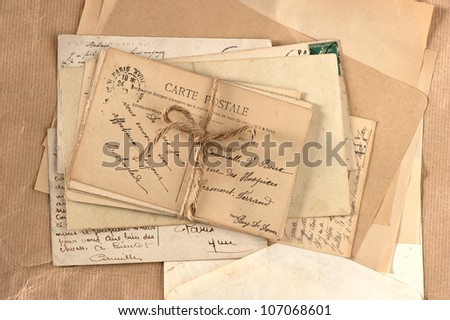 old letters and french postcards. vintage background