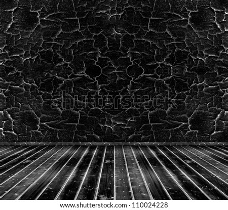 old black cracked wall and wooden floor. dark room interior background