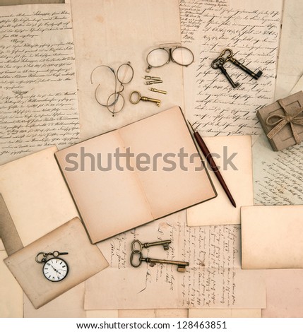 open book, vintage accessories, old letters and documents. nostalgic background