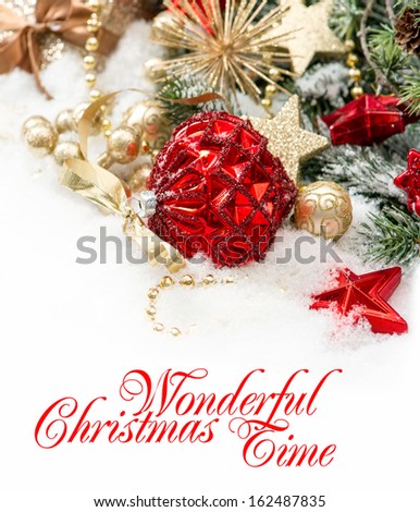 christmas composition with red baubles and golden decoration on white background. Card concept with sample text Wonderful Christmas Time