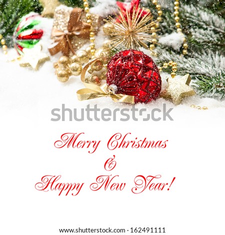 christmas composition with red baubles and golden decoration with falling snow effect. Card concept with sample text Merry Christmas and Happy New Year